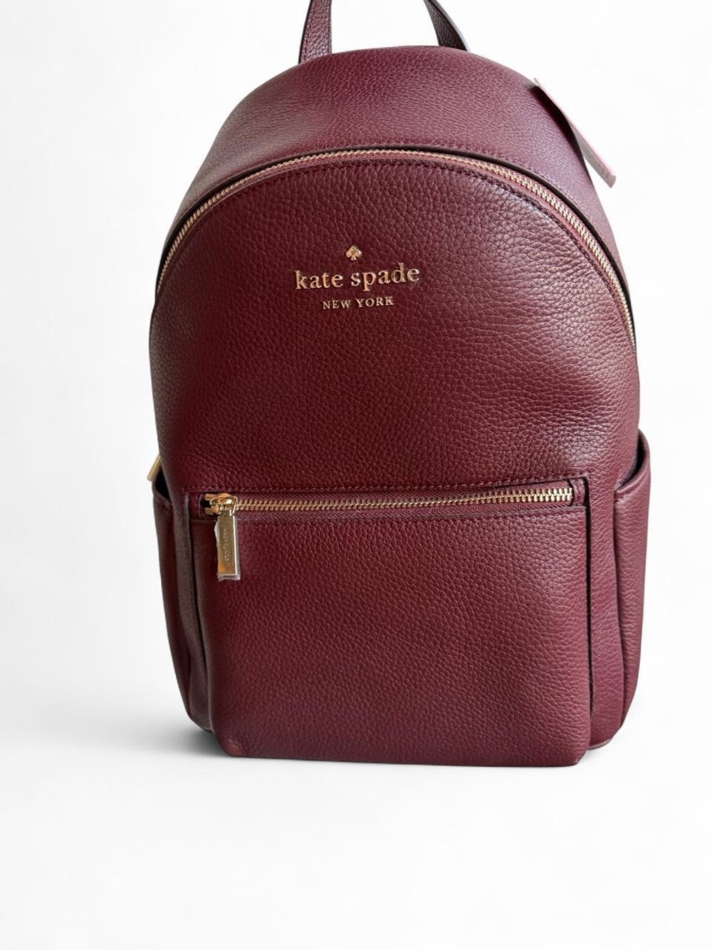 kate spade Pebbled Leather Backpack in Burgundy